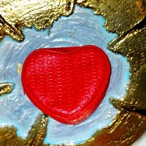 Really cute vintage heart change purse